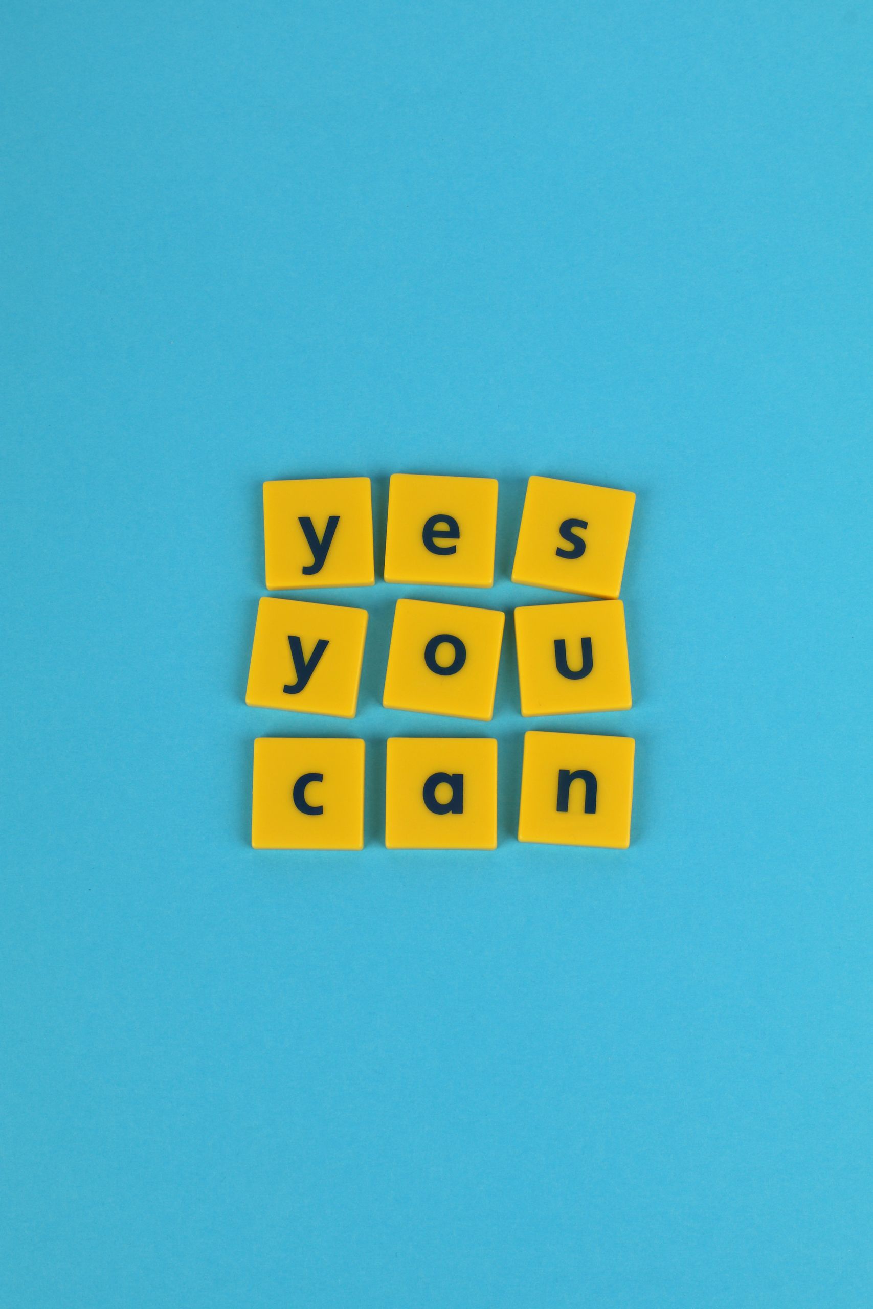 A positive affirmation spelling, 'yes you can', for promoting motivation and personal growth.